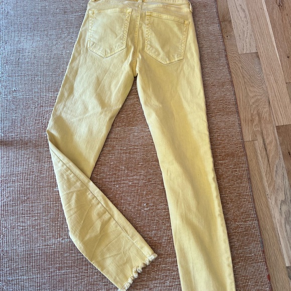 Mustard color fringe bottom stretch jeans - Picture 2 of 3